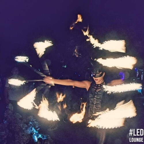 Catwoman with fire fans