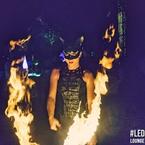 Catwoman with fire fans