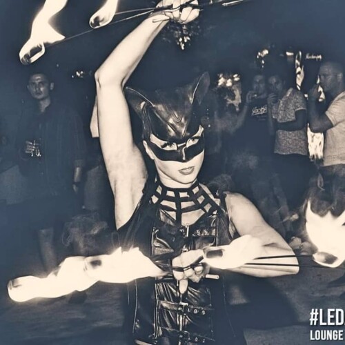 Catwoman with fire fans