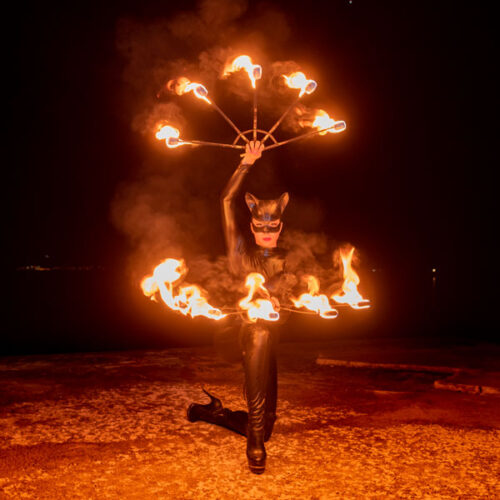 Catwoman with fire fans