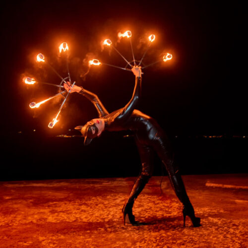 Catwoman with fire fans