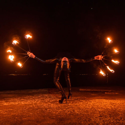 Catwoman with fire fans